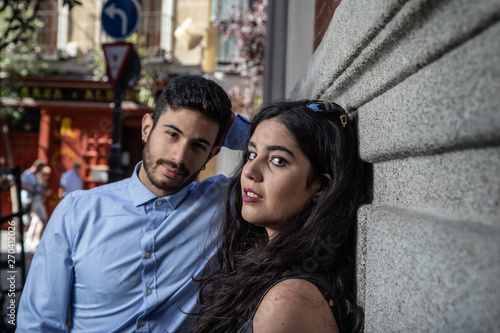 Beautiful portrait of young people. Man and woman looking at camera. © Alberto