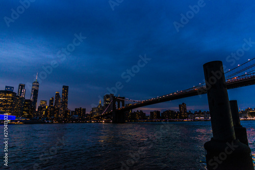 Skyline of skyscrapers at night in Manhattan  New York City  USA