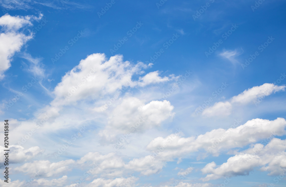 Fototapeta premium Blue sky with clouds background.Sky daylight. Natural sky composition. Element of design.