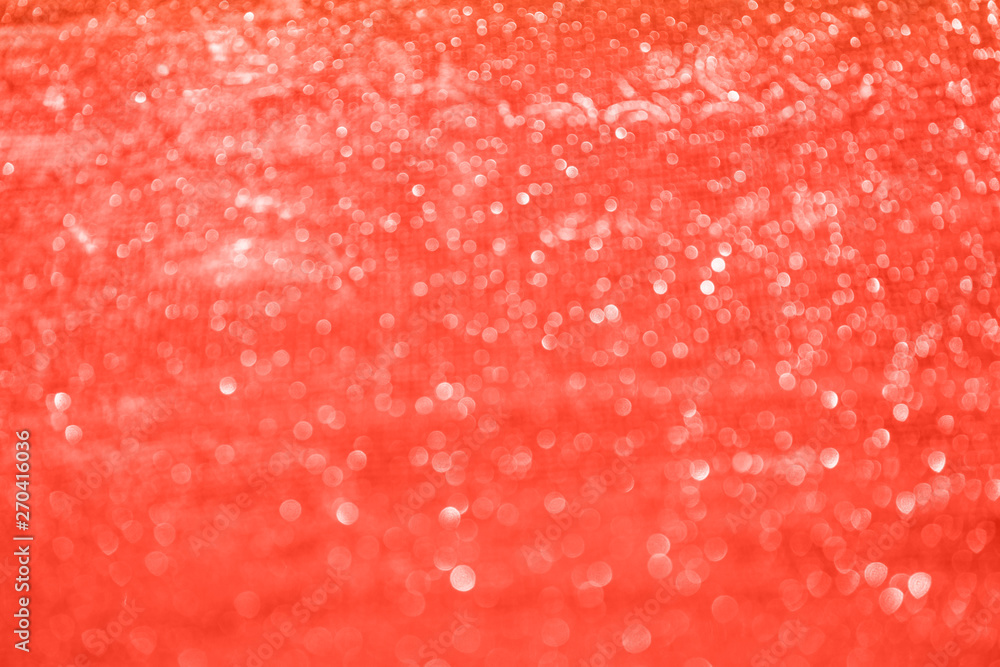 Blurred bokeh light red holographic background, Christmas and New Year holidays background. Party concept. Festive holiday bright backdrop. Defocused. Blurred bokeh light red holographic background, Christmas and New Year holidays background. Party concept. Festive holiday bright backdrop. Defocused.