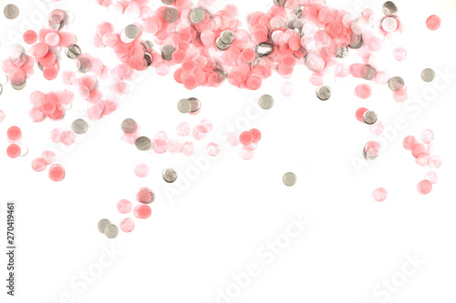 Delicate pink confetti isolated on white background.