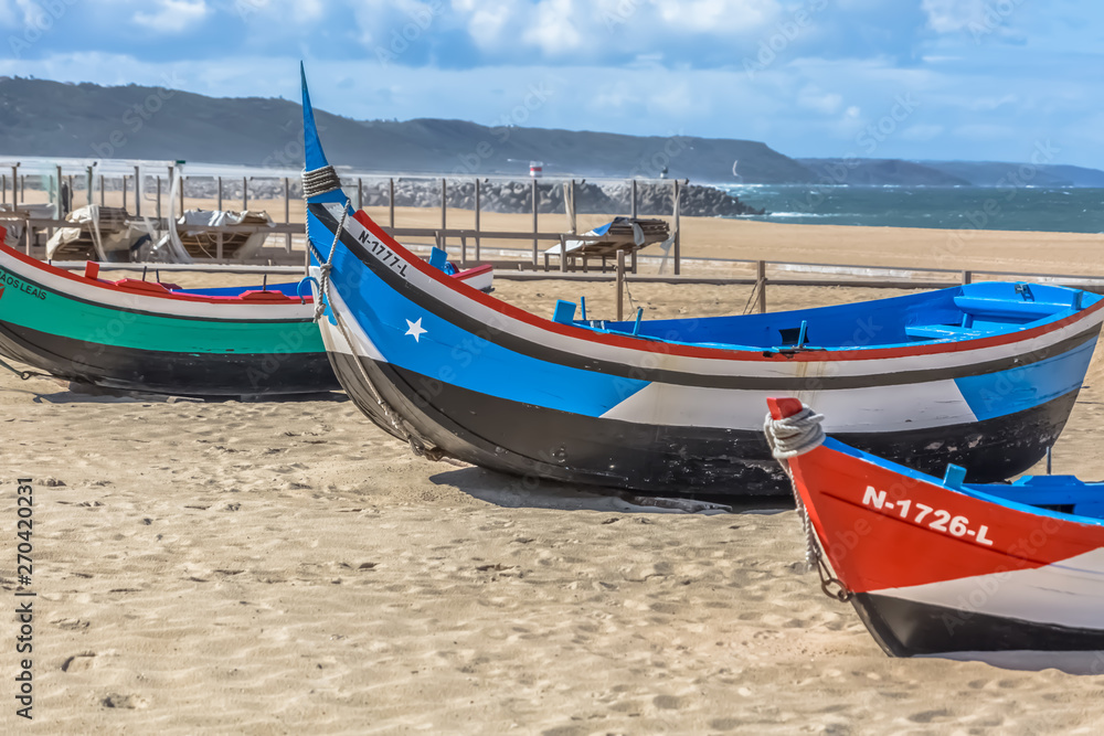 Detailed view of colored and traditional fishing boats on the Nazare beach Detailed view of colored and traditional fishing boats on the Nazare beach
