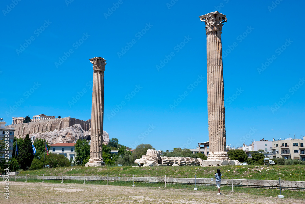 The ancient temple of Olympius Zeus or Olympion, near the Acropolis of Athens, Greece / May 2019. The ancient temple of Olympius Zeus or Olympion, near the Acropolis of Athens, Greece / May 2019.