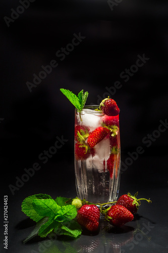 strawberry water with ice and mint in a glass