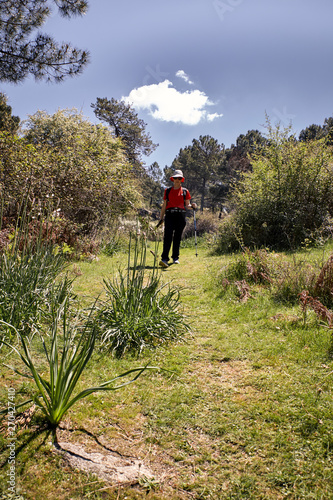 Woman doing trekking in nature © luismicss