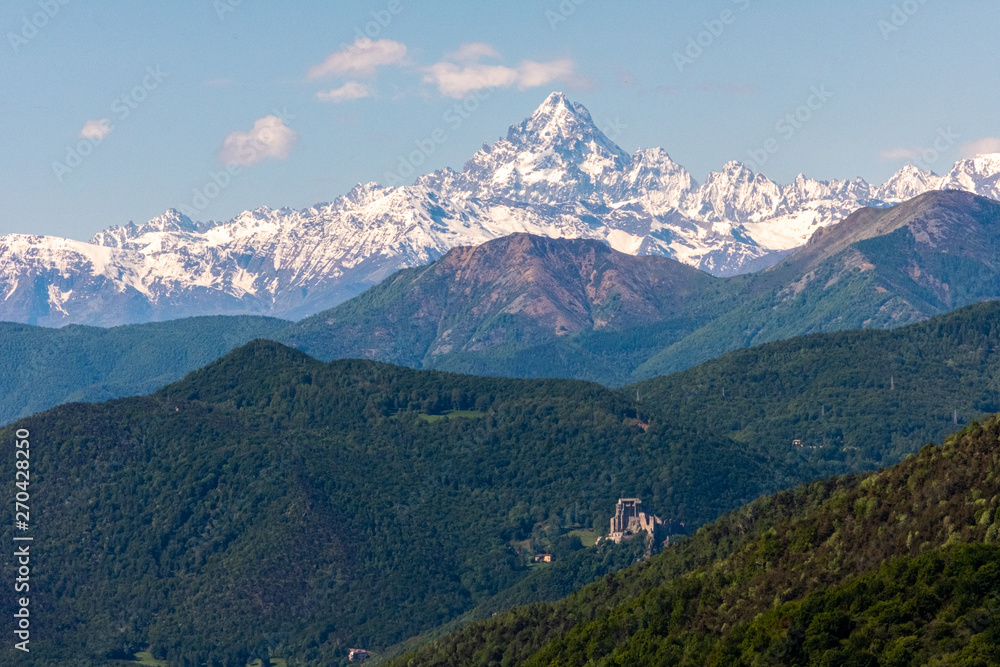 view of Monviso mountain  and Sacra di San Michele.