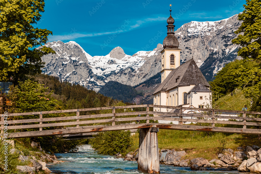 The famous church Saint Sebastian with the alps in the background at Ramsau - Bavaria - Germany