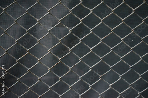 Stainless steel wire mesh with rust. Background.