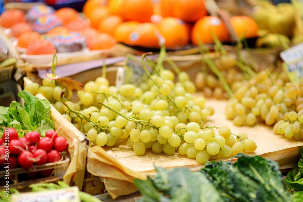 Assorted organic fruits sold on a marketplace in Genoa, Italy