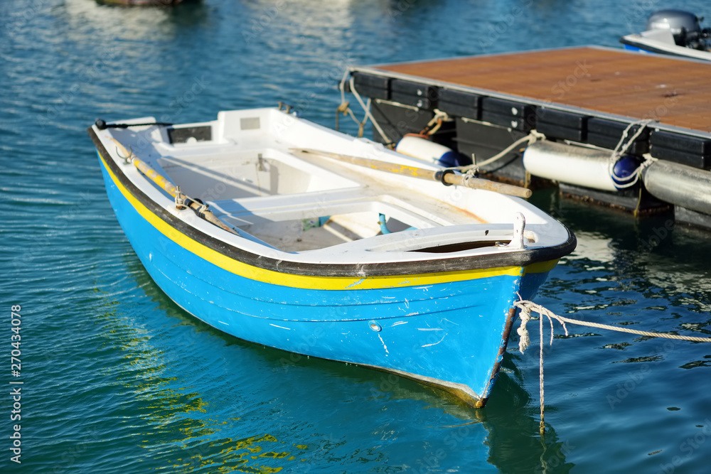 Small yachts and fishing boats in marina of Lerici town, a part of the Italian Riviera, Italy.