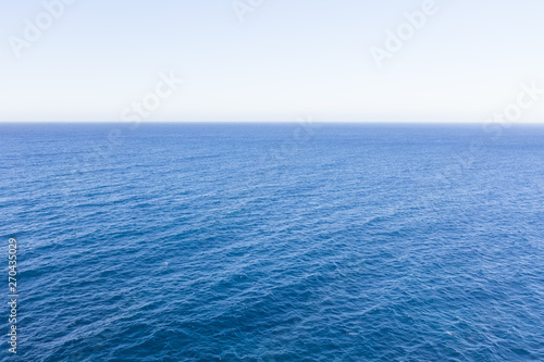 Blue sea and day horizon, empty nobody.