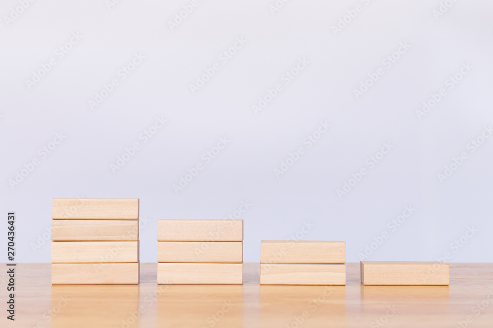 Wooden cube stack a staircase on white background. Concept of success, winner, victory or top ranking Wooden cube stack a staircase on white background. Concept of success, winner, victory or top ranking