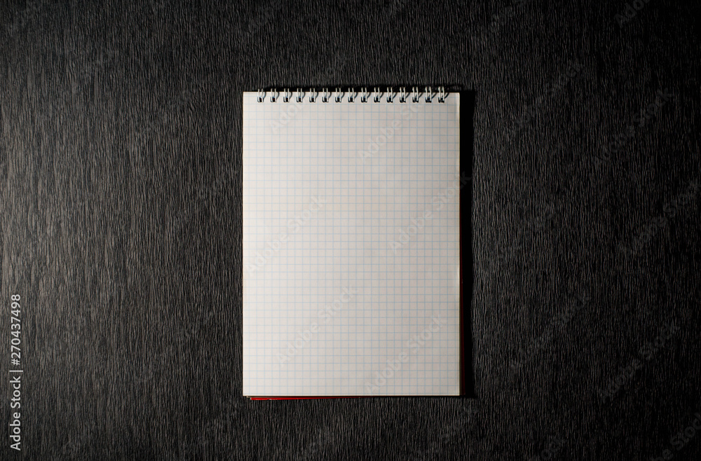 Notepad on a black background Notepad on a black background