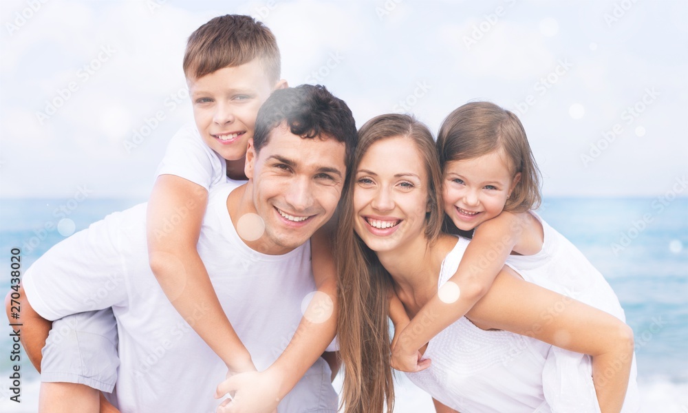 Beautiful smiling Lovely family on background Beautiful smiling Lovely family on background