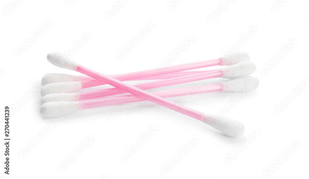 Pink plastic cotton swabs on white background Pink plastic cotton swabs on white background