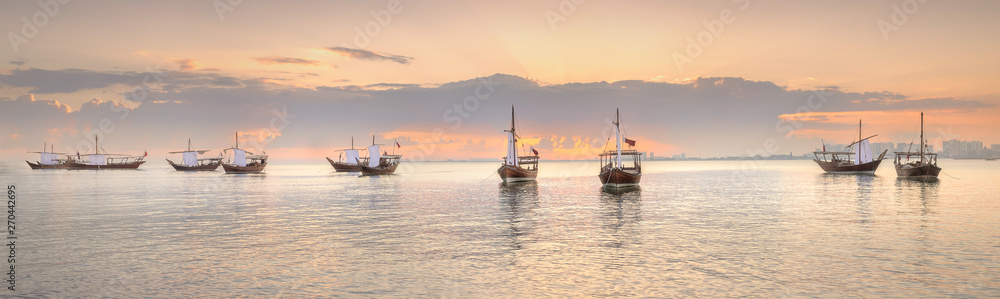 Fototapeta premium Traditional Arabic Dhow boats in Doha harbour, Qatar