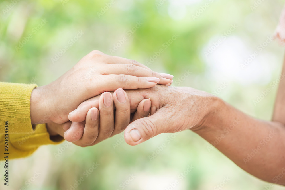 young and old woman hand holding each other ,helping hand concept Stock ...