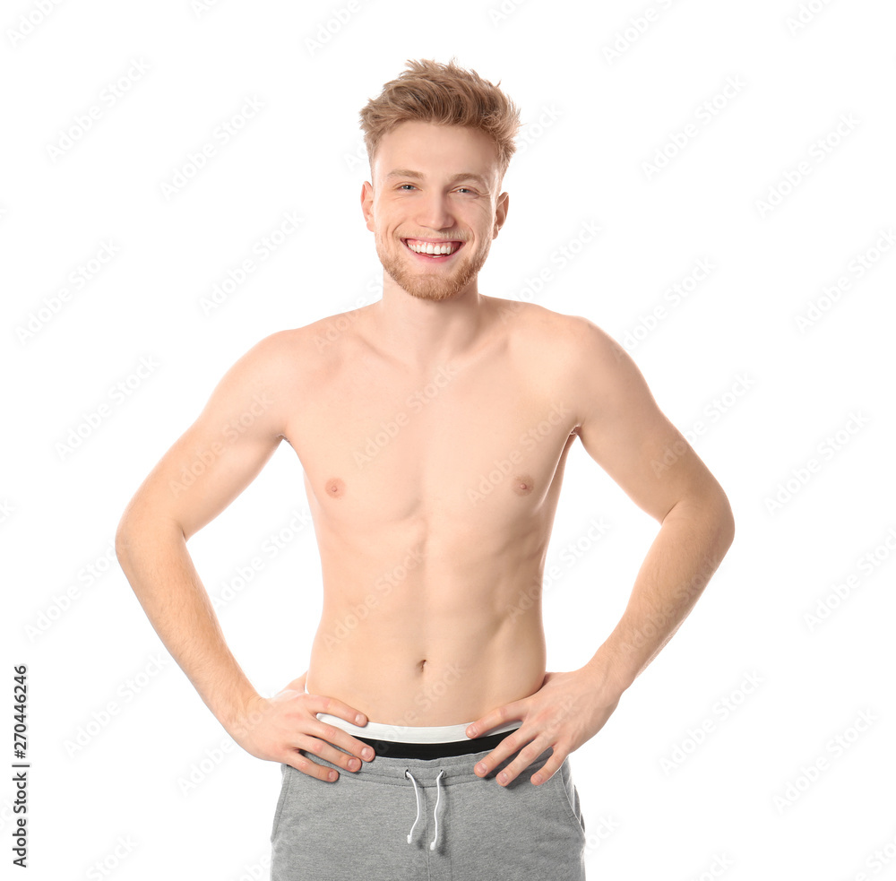 Portrait of young man with slim body on white background Portrait of young man with slim body on white background
