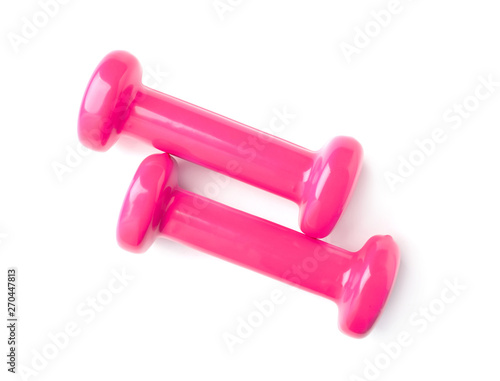 Color dumbbells on white background. Home fitness, top view