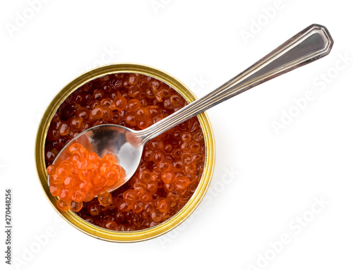 Salmon caviar in a can with a spoon on a white. The form of the top.