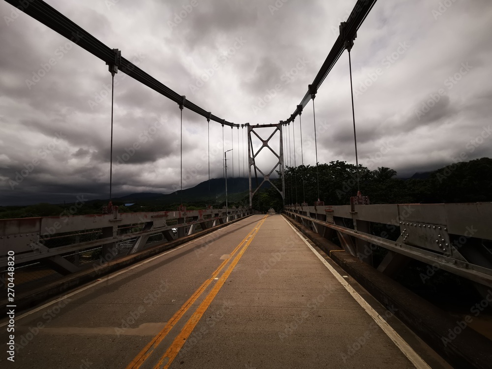 puente atardecer nubes cielo cuerdas calle carretera via paisaje colgante naturaleza 