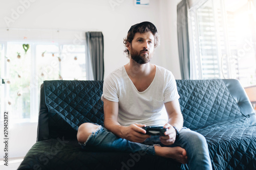 A man playing video games photo