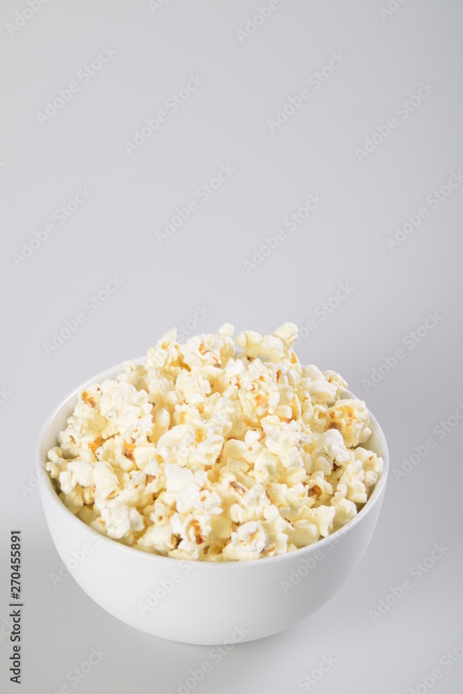 Bowl with popcorn. Isolated on white background.