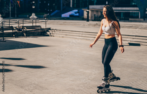 Woman wearing roller skates riding in town