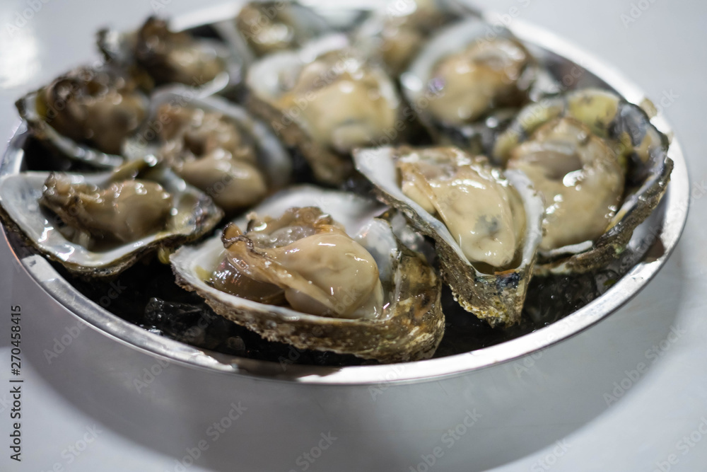 Fototapeta premium Fresh opened oyster.