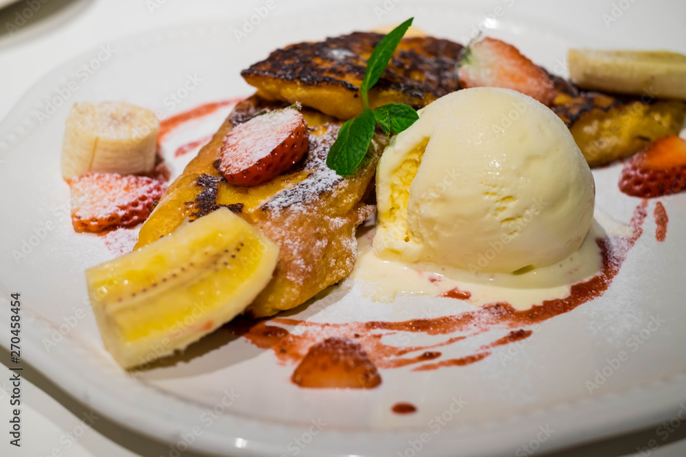 French toast with fresh fruits and ice cream. French toast with fresh fruits and ice cream.