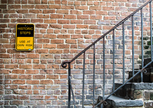 Historical stone steps with sign