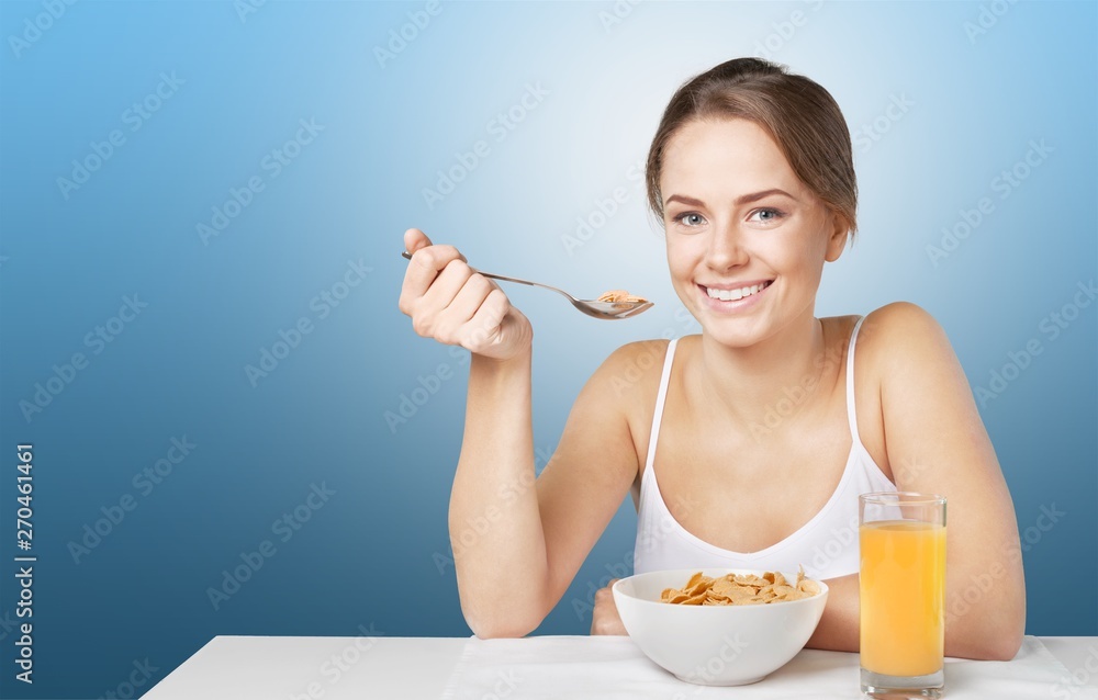 Young beautiful woman with fresh vegetables cooking Young beautiful woman with fresh vegetables cooking