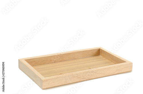 Empty wooden tray isolated on white background.  Kitchen ware for contain something. © ZhouEka