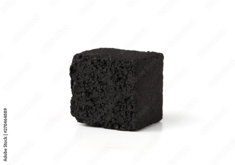 Coconut charcoal on a white background. Coconut coal cubes for hookah close-up. Coconut charcoal on a white background. Coconut coal cubes for hookah close-up.