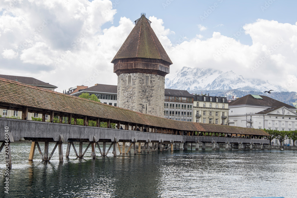 Old Tower and Bridge at Lucerne Switzerland on April 18, 2017
