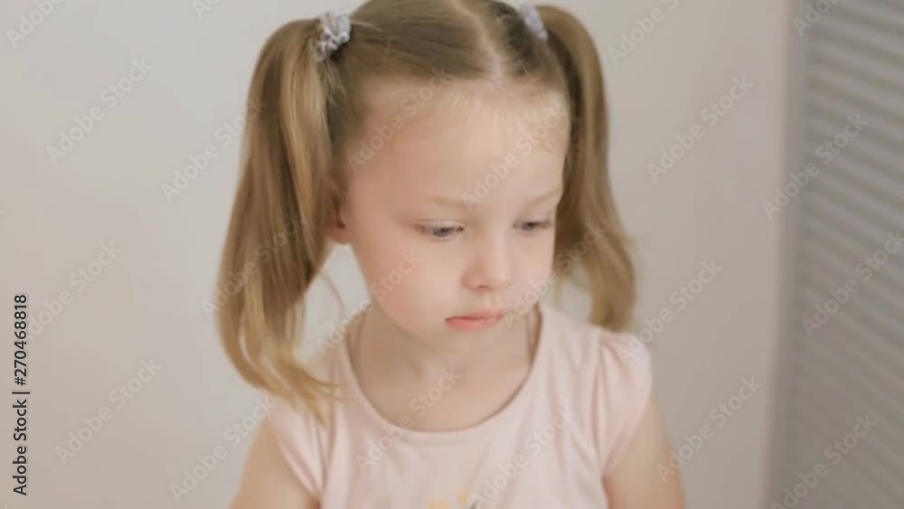 portrait of a little girl on a white background portrait of a little girl on a white background