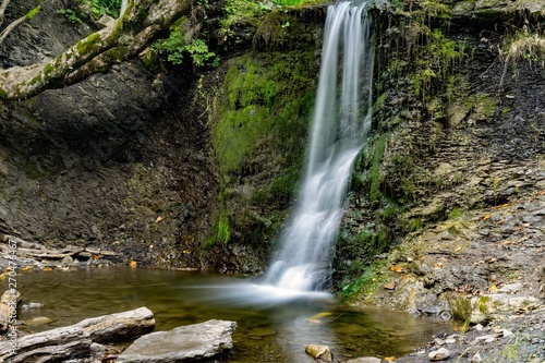 waterfall falling to the river