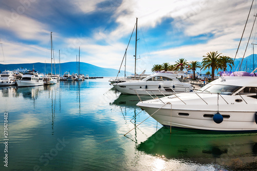 Luxury yachts in the sea port of Tivat, Montenegro. Kotor bay, Adriatic sea. Famous travel destination.