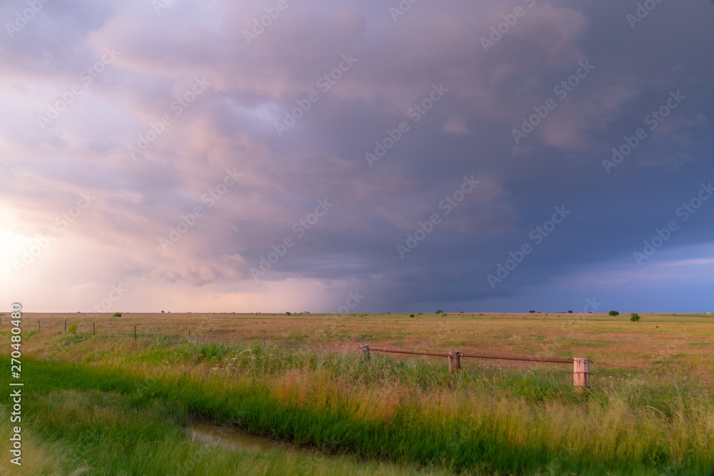 Storm passing at sunset