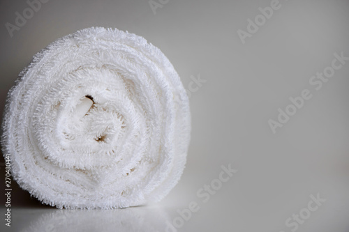 White delicate soft background of clean white close up towel rolled blanket textile