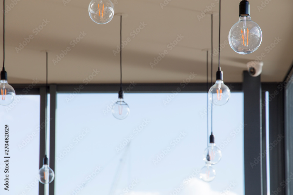 Bulbs hanging of the ceiling in restaurant