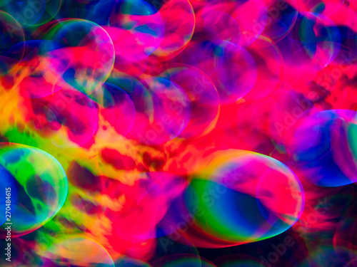 Sweet rainbow disco gradient. Natural lighting effects. Background image is abstract blurred backdrop. Defocused urban abstract texture. Ecological ideas for your graphic design, banner, or poster
