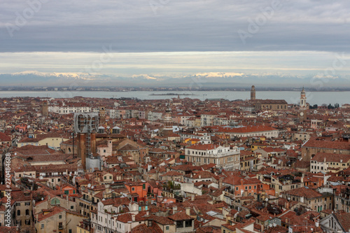 Red roofs of Venice. Old european city background. Aerial view of the rooftops of Venice., Italy © Dmitry