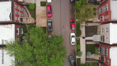 Chicago Neighborhood aerial drone street summer cars parking rising