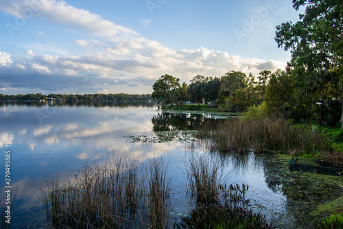 Beautiful cloudy sky reflected over the water