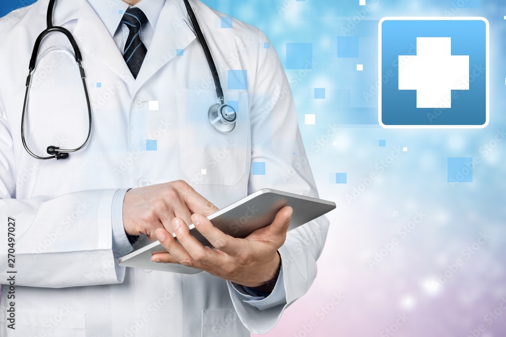 Close-up Doctor at hospital working with tablet pc Close-up Doctor at hospital working with tablet pc