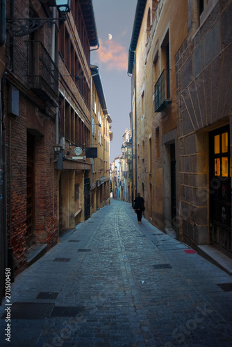 Narrow street in old town of Segovia, Spain