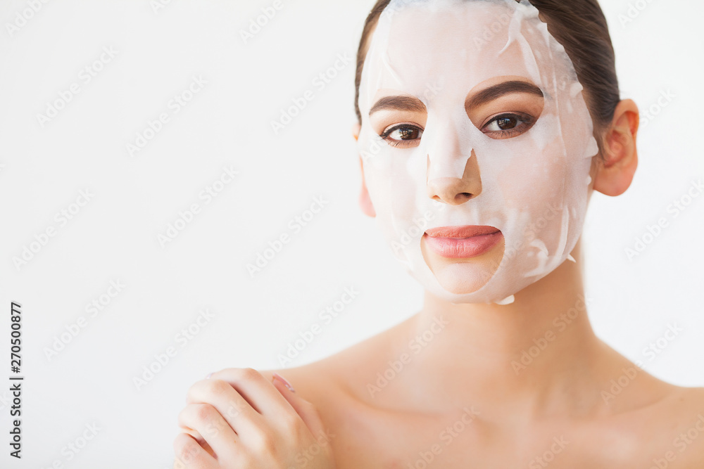 Skin Care. Young Female Removing Mask From Facial Skin. Woman Beauty Face Skin Care. Young Female Removing Mask From Facial Skin. Woman Beauty Face