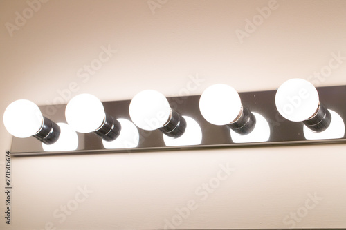 Fototapeta Naklejka Na Ścianę i Meble -  lights in a bathroom closeup - Image