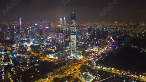 night time illumination kuala lumpur city downtown traffic aerial panorama 4k timelapse malaysia  photo